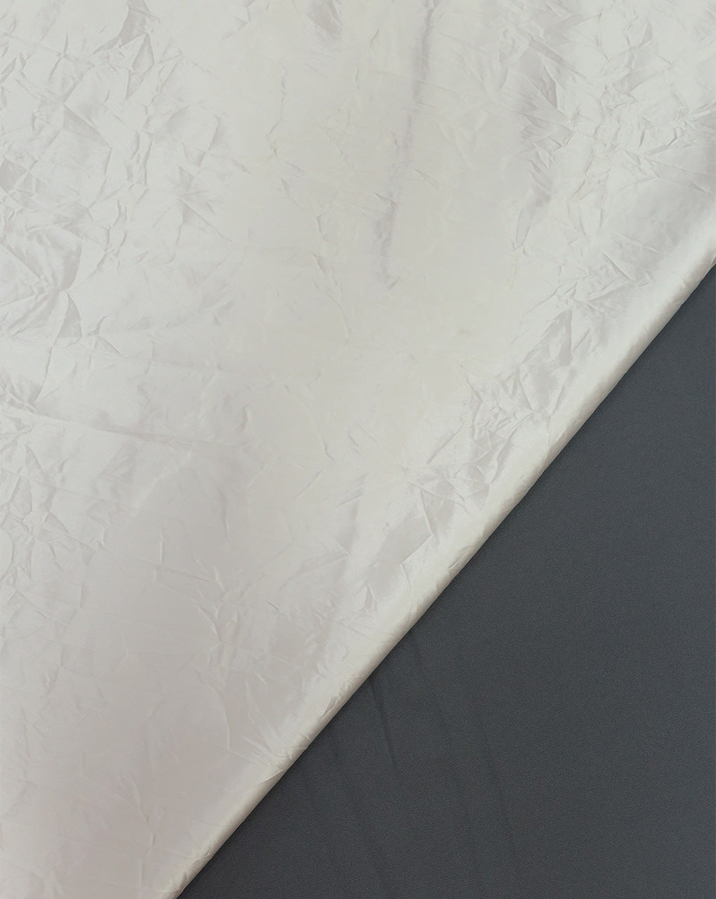 WHITE CRUSHED POLYESTER SATIN FABRIC