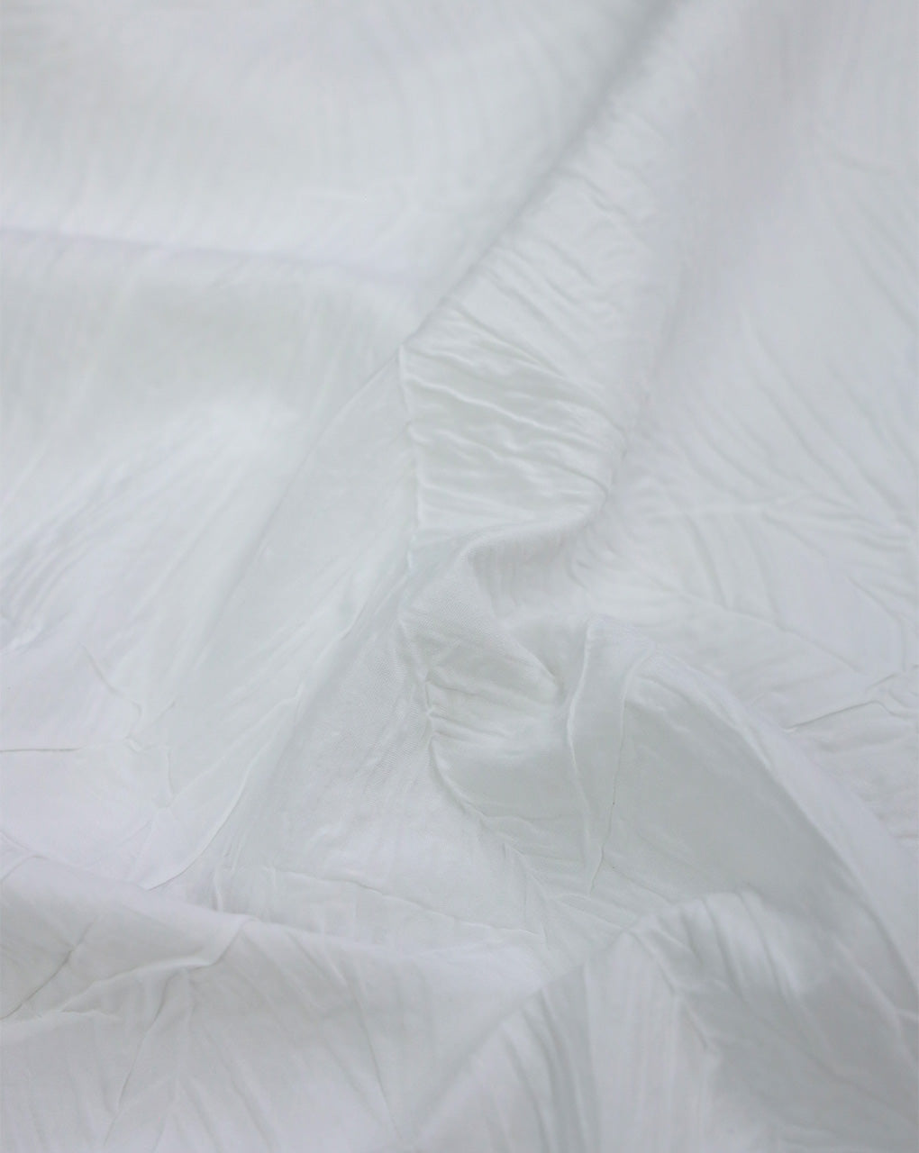 WHITE CRUSHED PLEATED FABRIC