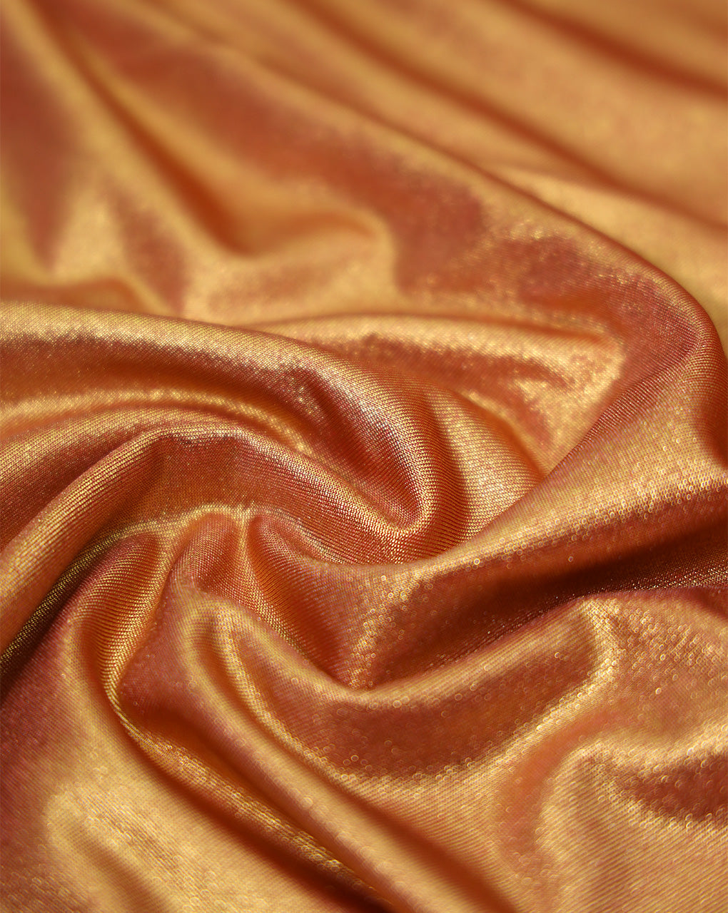 DARK PEACH POLYESTER KNITTED FOIL FABRIC