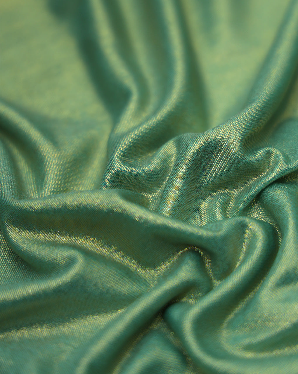 SEA GREEN POLYESTER KNITTED FOIL FABRIC