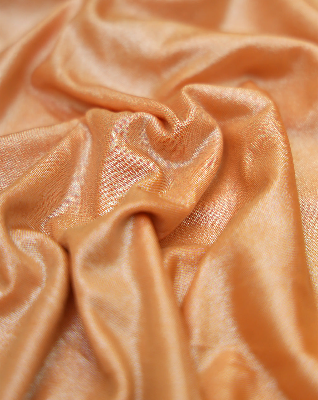 LIGHT PEACH POLYESTER KNITTED FOIL FABRIC