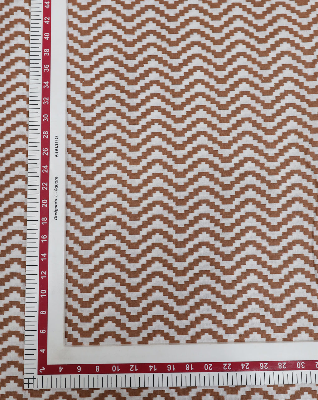 WHITE & BROWN ZIGZAG DESIGN PRINTED POLYESTER SPUN FABRIC