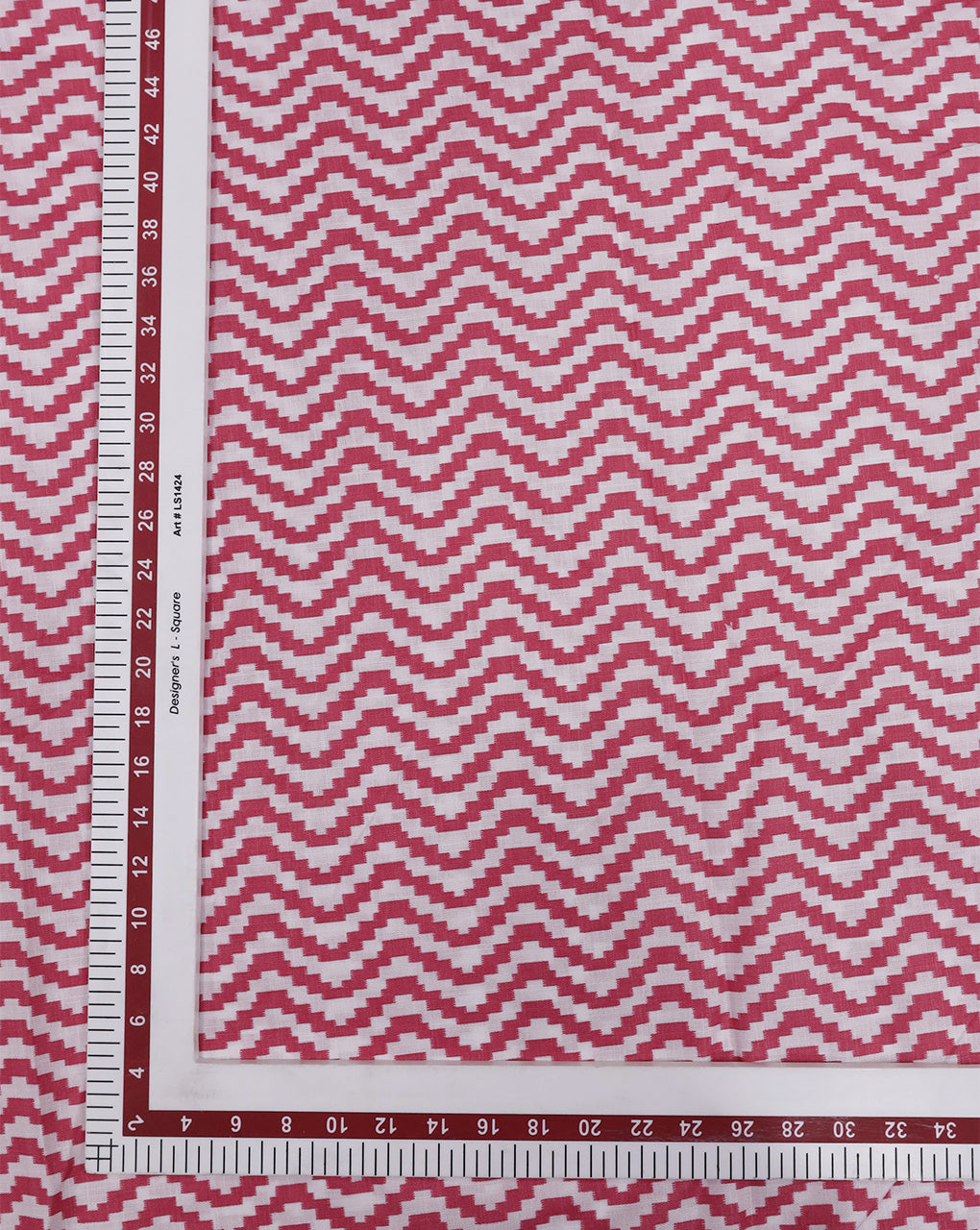 WHITE & PINK ZIGZAG DESIGN PRINTED POLYESTER SPUN FABRIC