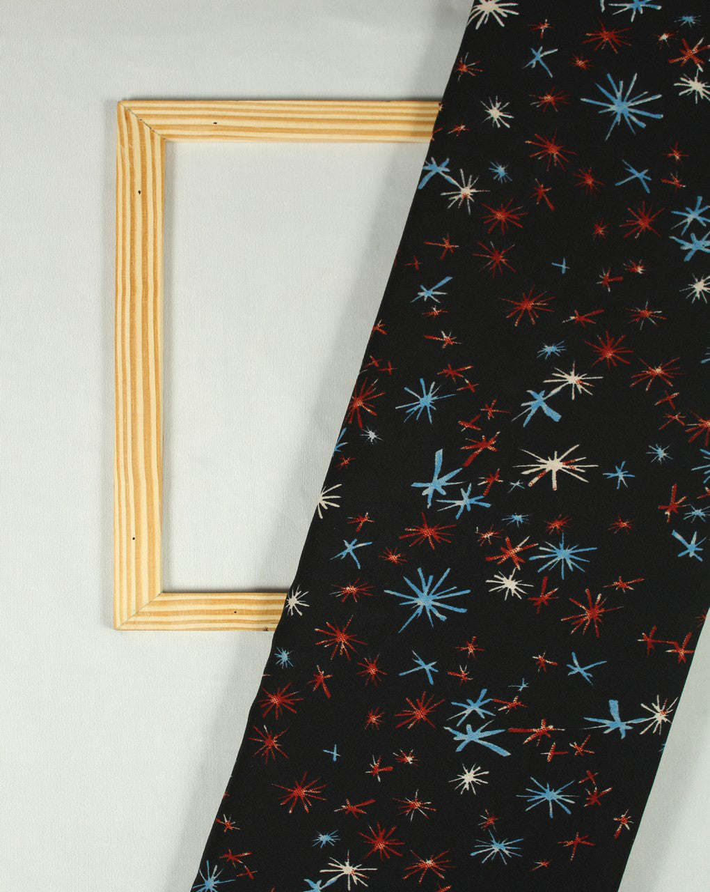 Black And Multicolor Cracker Spark Design Polyester Crepe Fabric