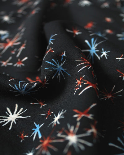 Black And Multicolor Cracker Spark Design Polyester Crepe Fabric