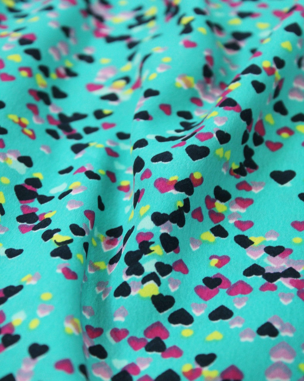 Green And Multicolor Heart Print Polyester Crepe Fabric