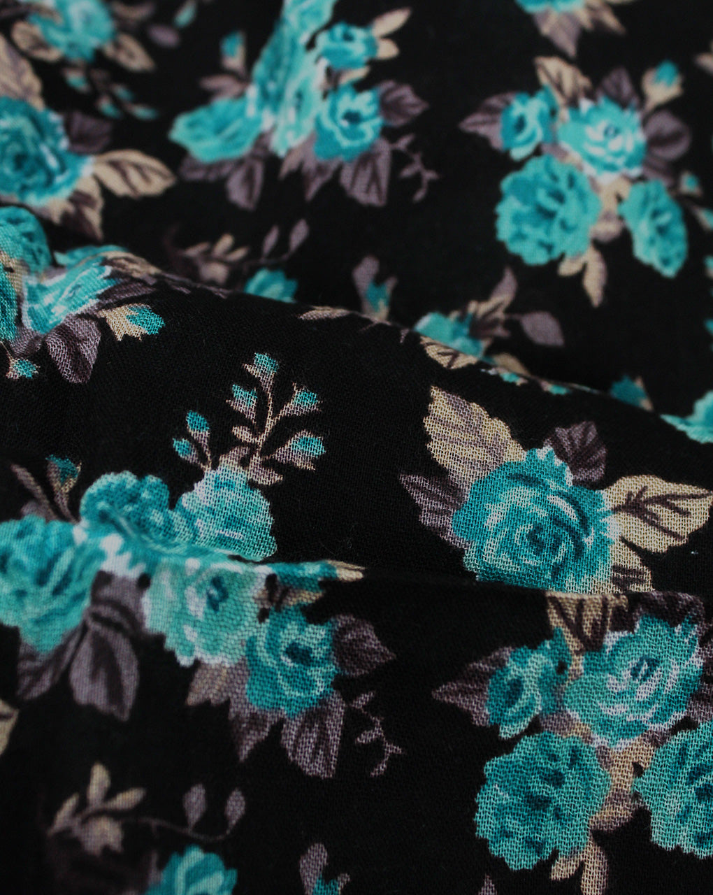 BLACK & GREEN FLORAL DESIGN COTTON CREPE PRINTED FABRIC