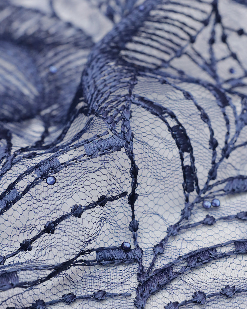 BLUE LEAF POLYESTER NET DESIGNER FABRIC (WIDTH 52 INCHES)