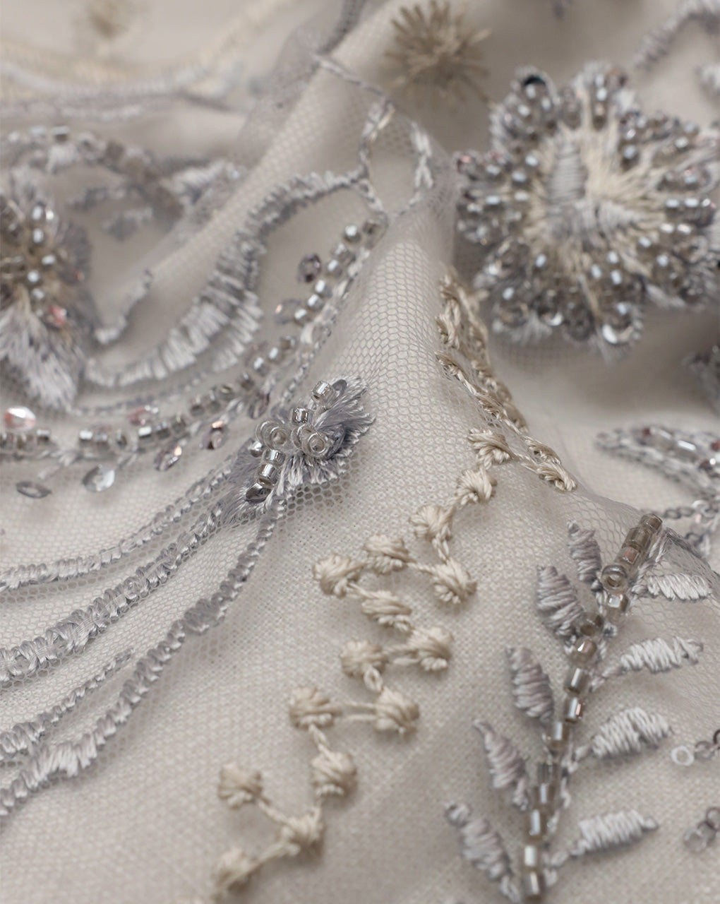SILVER FLORAL EMBROIDERY POLYESTER NET DESIGNER FABRIC (WIDTH 56 INCHES)