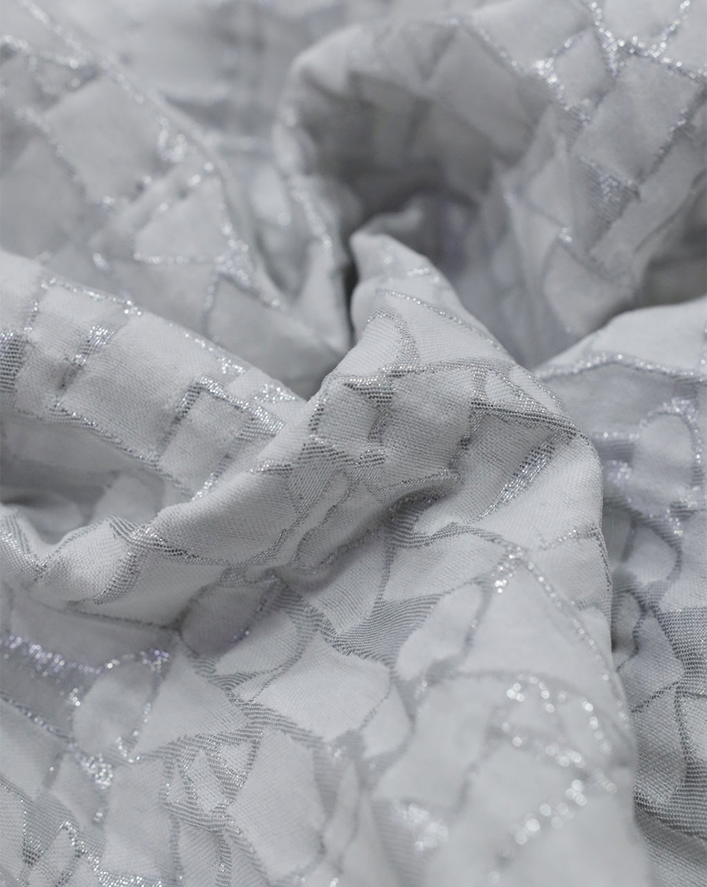 WHITE POLYESTER EMBOSSED JACQUARD FABRIC