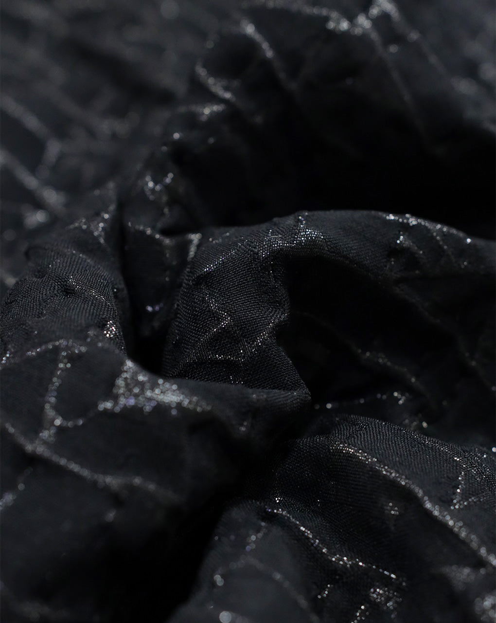 BLACK POLYESTER EMBOSSED JACQUARD FABRIC