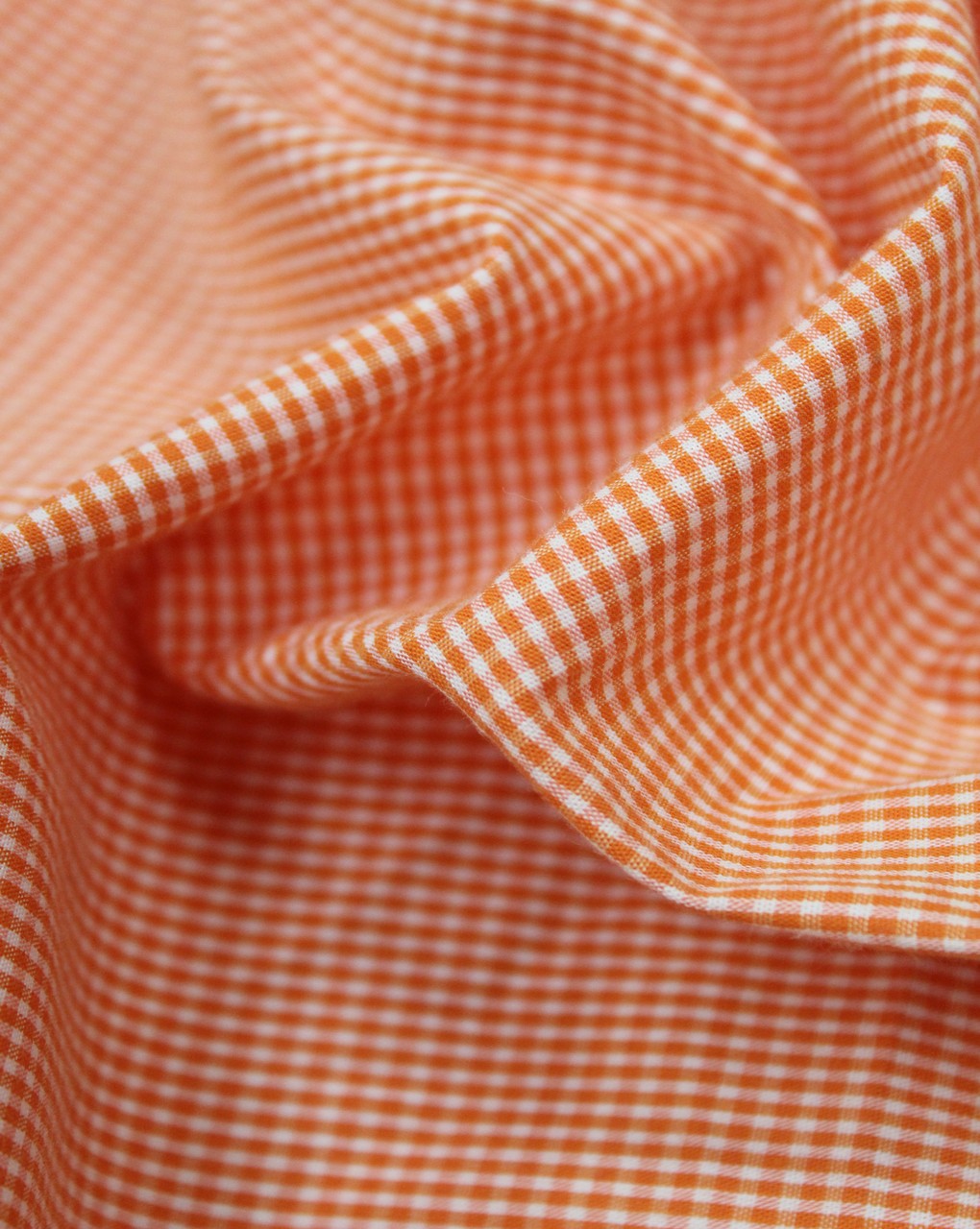 White And Orange Checks Cotton Cambric Fabric